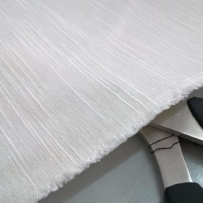 Tessuto per arredamento con trama rigata colore panna al metro 2 forbici