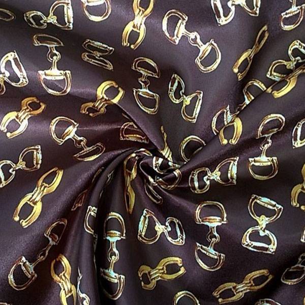 Tessuto da abbigliamento con fantasia a fibbie oro e argento al metro arricciato 5