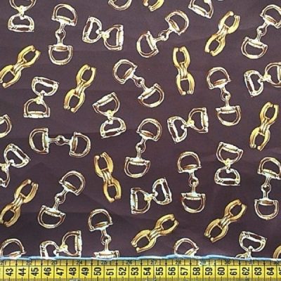 Tessuto da abbigliamento con fantasia a fibbie oro e argento al metro con riga 1