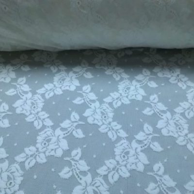 Pizzo a rete fantasia floreale Alt.145 cm