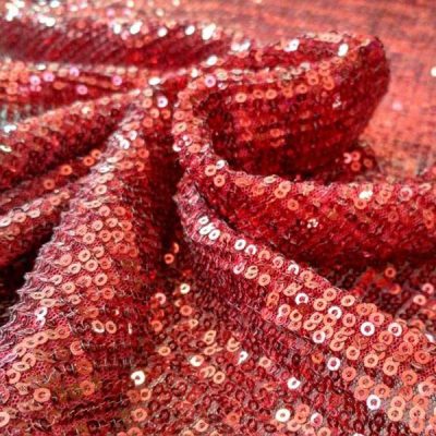 Pizzo con paillettes elasticizzato rame brillante 1