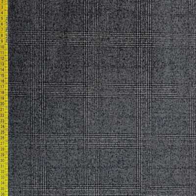 Tessuto in pura lana a quadretti bianco e opaco blu 3