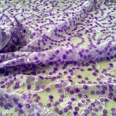 Tessuto in tulle con paillettes motivo floreale viola 1