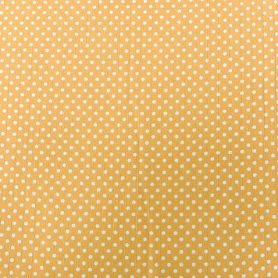 Tessuto multiuso con pois bianchi su giallo ambra 2
