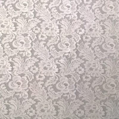 Tessuto per abito in pizzo elasticizzato motivo floreale bianco 2