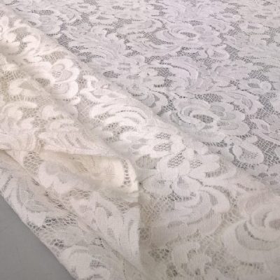 Tessuto per abito in pizzo elasticizzato motivo floreale bianco 5