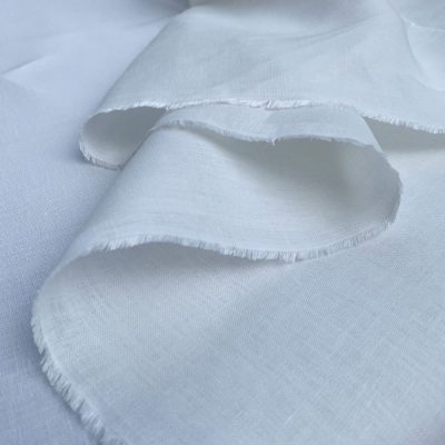 Tessuto puro lino abbraccio di morbidezza per abbigliamento bianco 1