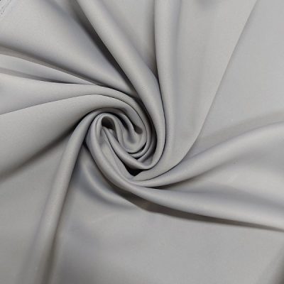 Tessuto per tende ignifugo C1 oscurante grigio arricciato 1