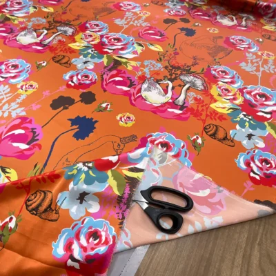 Tessuto in raso fantasia fiori e cigni su sfondo arancione 2