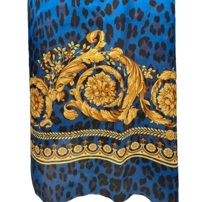 Scampolo alta moda 100% raso di seta animalier con ghirigori dorati manichino 2