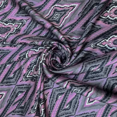 Tessuto in raso di seta alta moda Made in Italy fantasia geometrica a rombi 1