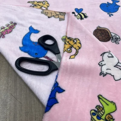 Tessuto pile bimbo con animali giocosi 3